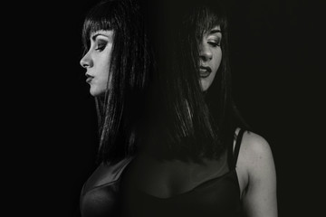 Fototapeta na wymiar women posing on black background