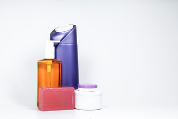 Shampoo bottles close-up. White background. A photo was taken in the studio.