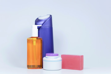 Shampoo bottles close-up. White background. A photo was taken in the studio.