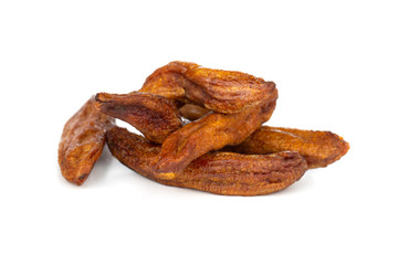 Sun-dried bananas on a white background. Several dried bananas isolated on a white background.
