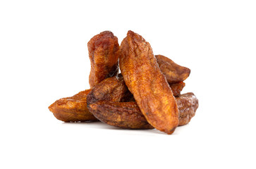 Sun-dried bananas on a white background. Dried bananas close-up.