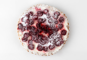 Cherry pie on a white background. Homemade cherry pie close-up. Top View.