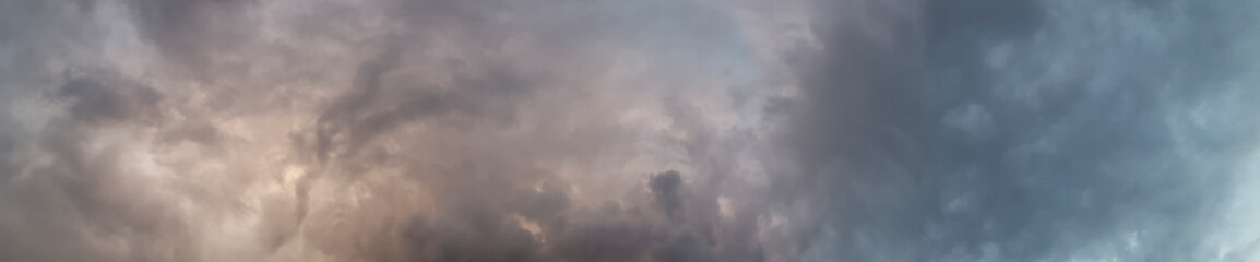 Fototapeta na wymiar Dark sky with clouds and a coming storm