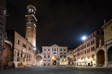 Obraz premium VERONA, ITALY-APRIL 21, 2019: View on Piazza dei Signori at night, the famous square in Verona, Veneto, Italy