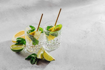 Homemade lemonade. Summer drinks with fresh citrus and ice.