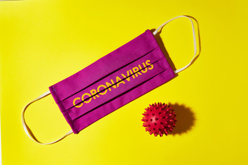 Doctor mask and corona virus protection isolated on a yellow background