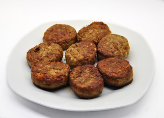  fried cutlets on a white plate