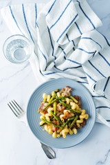 Fried Bacon roasted asparagus pasta in a plate