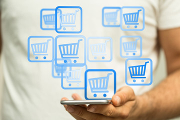 Businessman pressing modern technology panel shopping cart web phone credit card.