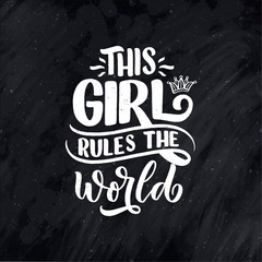 This girl rules the world hand drawn vector lettering. Funny phrase for print and poster design. Inspirational feminism slogan. Girl power quote. Women's day greeting card template. Vector