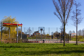 Playground cordoned off because of the corona virus. German word Spielplatz means playground