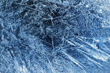 Winter background with an ice texture, frozen window