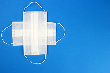 Cross from Medical protective shielding bands on a blue background