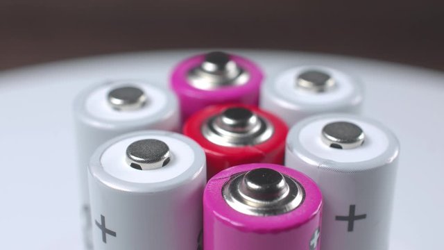 white and pink rechargeable batteries top view