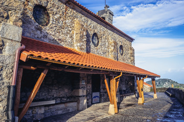 John the Baptist Chapel of hermitage located on the rocky Gaztelugatxe islet in Biscay region, Spain - obrazy, fototapety, plakaty