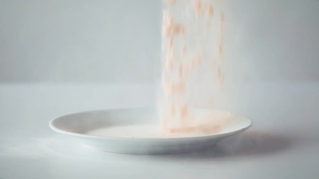 Pouring powder on the plate