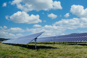 photovoltaic solar power panel on sky background, green clean Alternative power energy concept.