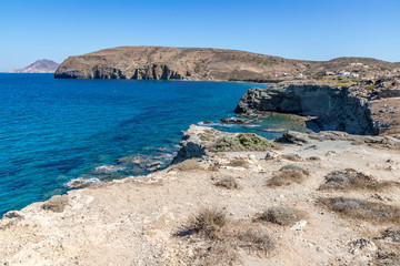 Fototapeta na wymiar Houses, cliffs and mountains in Papafragas beach