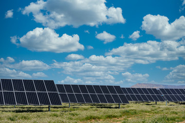 photovoltaic solar power panel on sky background, green clean Alternative power energy concept.