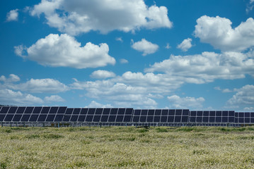 photovoltaic solar power panel on sky background, green clean Alternative power energy concept.