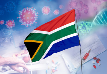 Coronavirus (COVID-19) outbreak and coronaviruses influenza background as dangerous flu strain cases as a pandemic medical health risk. South Africa Flag with corona virus and their prevention.