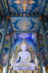 Fototapeta premium Buddha Statue Inside of Wat Rong Seur Ten (Blue Temple), Chiang Rai, Thailand, Asia