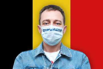 Man in a denim jacket and medical breathing mask. masked man on a white background