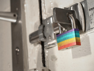 A bolted door secured by a padlock with the national flag of Peace on it.(series)
