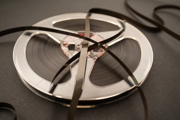 old tape for stereo recording on black background