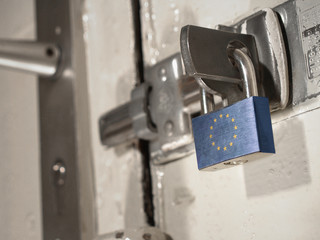 A bolted door secured by a padlock with the national flag of European Union on it.(series)