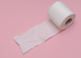  Toilet paper on pink background.