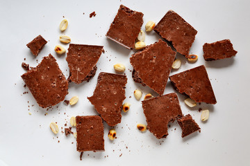 Chocolate on a white background, isolated. Porous Chocolate Texture