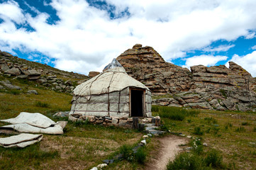 A traditional Mongolian yurt  (ger) is a portable, round tent covered with skins or felt and used as a dwelling by Mongolian nomadic groups in the steppes of Central Asia.