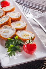Scotch egg meat balls on rustic wooden background