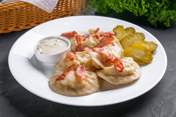 traditional Ukrainian dish of dumplings with sour cream