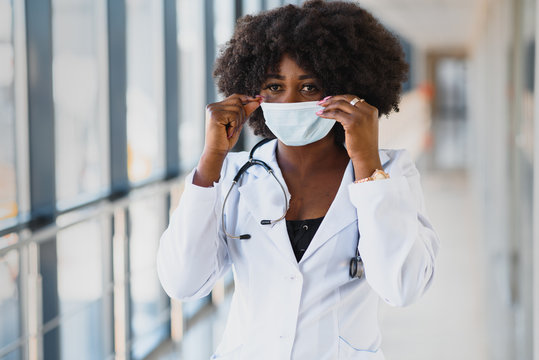 Young Attractive African Doctor With Face Mask