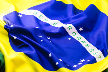 detail of the flag of brazil, in macro photography. Image with concept of patriotism, nationalism or beloved homeland. Visible text from: Order and progress