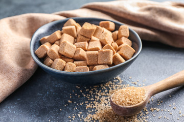 Brown sugar on dark background