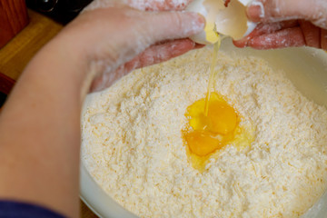 Making dough for baking cheese bread called chipa.