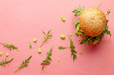 Veggie beet and lentil burgers with vegetables and avocado sauce. Healthy food concept.