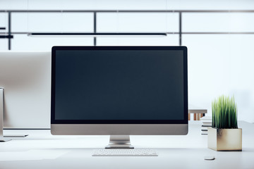 Computer on modern designer workplace