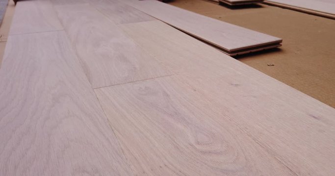 Production line of the wooden floor factory. Industrial background