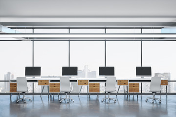 Coworking office room with computers