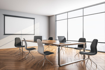Meeting room interior with blank tv screen