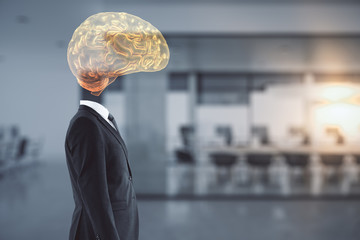 Businessman with a brain hologram instead of a head