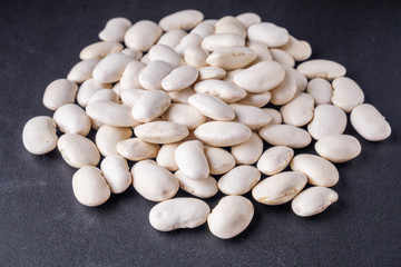 fresh organic natural beans on black background