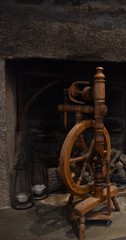 antique spool spinner by furnace 