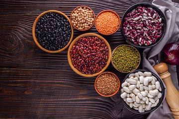 Fresh organic natural beans on wooden rustic background