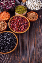 Fresh organic natural beans on wooden rustic background