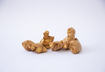 fresh ginger root on white background